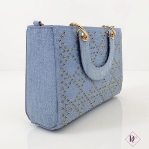 borsa rigida blu jeans con borchie oro e tracolla de caro